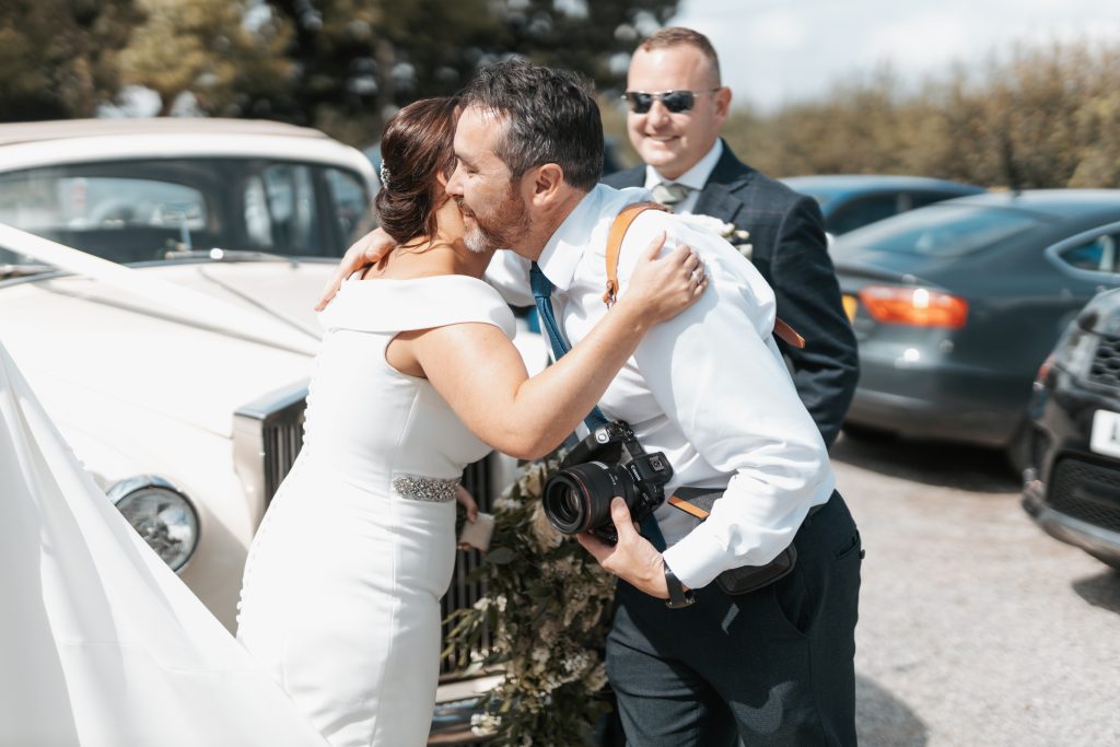 Photographer congratulating bride during photography and videography
Wedding Videographer and Photographer Wiltshire