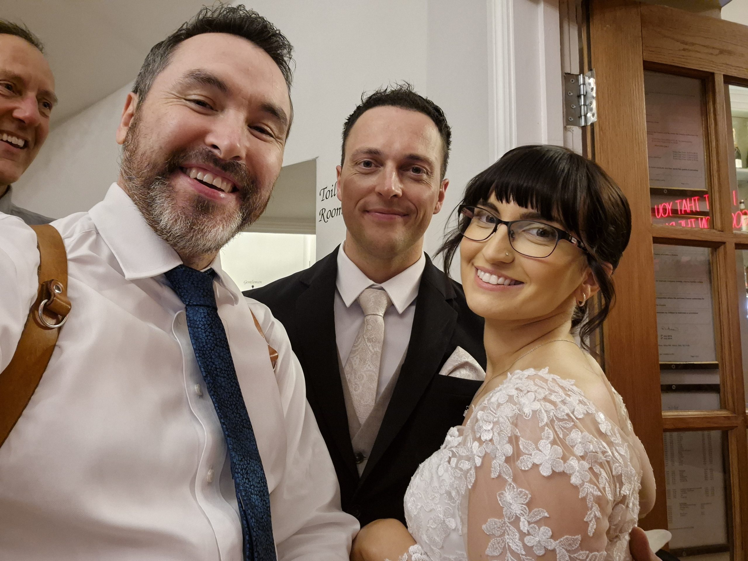 James with a wedding couple