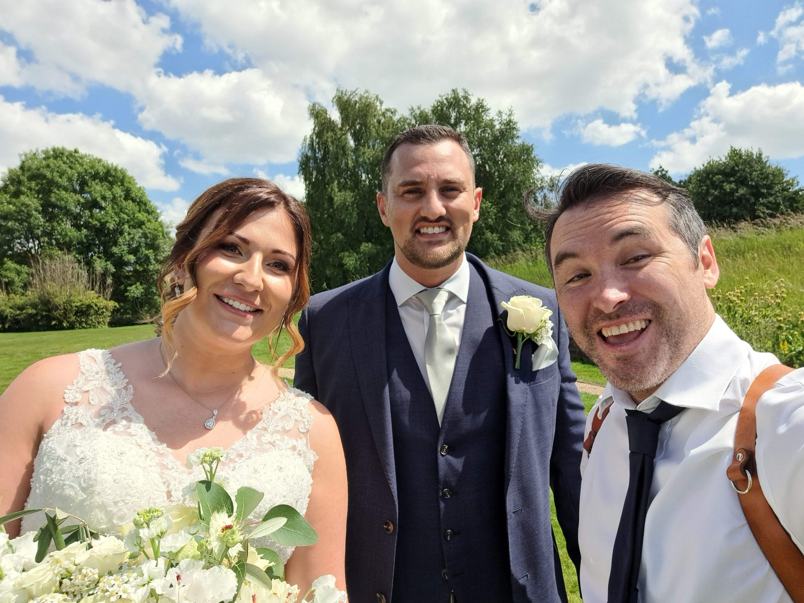 James with a bride and groom